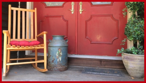 The rocker just fits perfectly.  Our next projects in the coming weeks  is to stain the deck and repaint the doors. Do you think I should sand down my vintage milk can and repaint it, too?