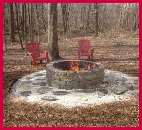 Don't you love the fire pit and the red Adirondeck chairs? Photo courtesy of Peter Darbisi