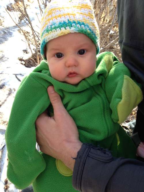 Ava in her Warm Frog Suit.  Our little tadpole!