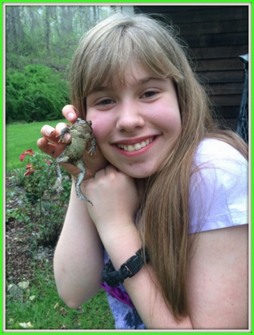 My daughter saved this toad from certain tragedy inside the chicken coop.