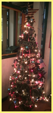 For summer, the tree is done up in red, white, and blue. Past themes include Easter, Back to School, and Halloween, to name a few.