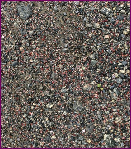 The red you see is garnet in the road.