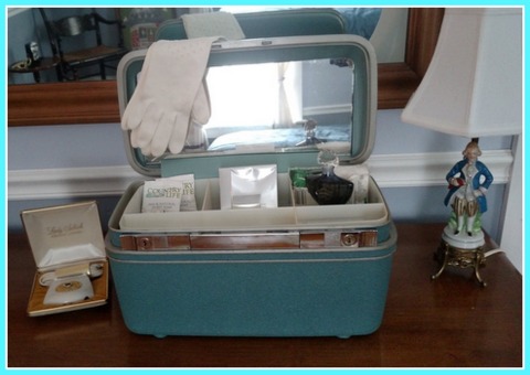 Leave an opened vintage train case stocked with toiletries in your guest room. p