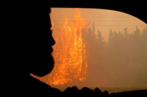 The Fire as seen by evacuating motorists.  Photo courtesy of Stefan Hinman, KTUU.