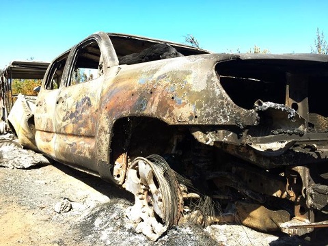 Burnt out truck in aftermath of fire.  Photo courtesy of KTUU.