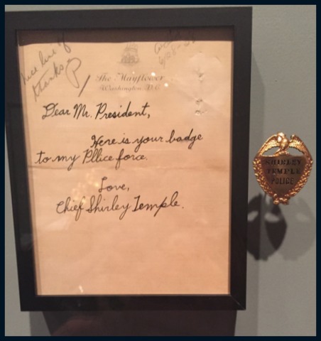 while my favorite was the badge presented to FDR by Shirley Temple in 1938. On the set of "Heidi", she was dubbed the "chief" for her ability to keep the others in order. 