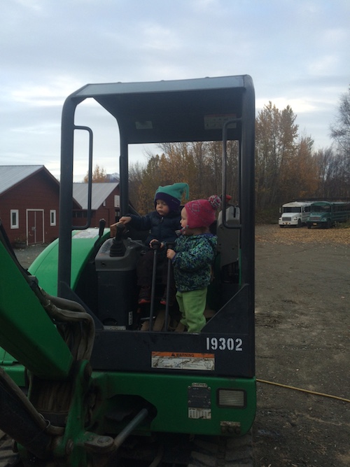 Ava and Porter play on a digger.  Cuties!