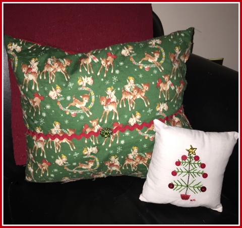 Comfy handmade pillows in vintage prints make for a comfy reading corner.