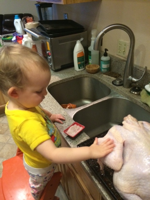 Maybe she'll take over the turkey prep, too?  Here she is helping me dry brine the "kurkey."