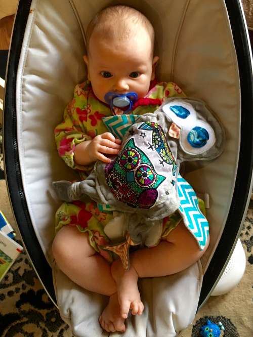 I made this little pacifier holder lovey for Opal for Easter.  She digs it.