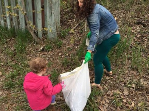 Picking up trash in the neighborhood