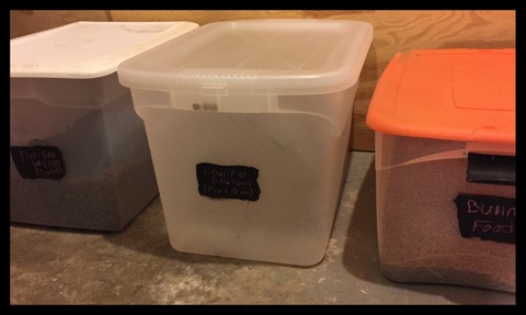 Since we buy dog food, bunny, and chicken feed in bulk, we store extra in air tight containers. Using chalkboard paint for labels means I can easily switch the contents.
