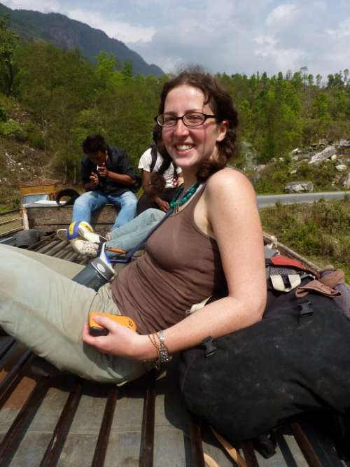 Riding back to Pokhara on the top of a mini bus.  