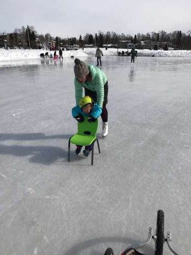 Trying to teach a three year old to skate necessitates focus!...And arm strength...And patience.