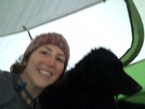 Our only photo in the tent.  Blurry from the wind, Moki obviously enjoying it...