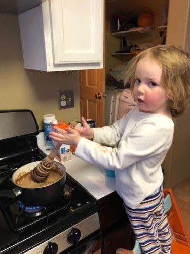 Ava using our official hot chocolate stirrer.