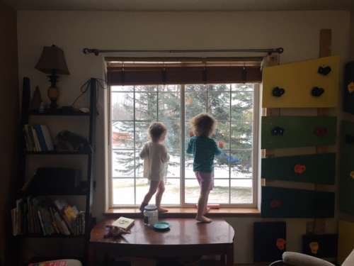 The girls admiring the morning snow fall.