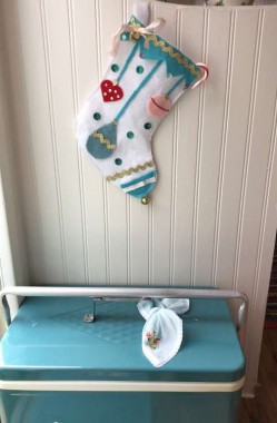 ...I made this felt stocking for the camper. Many of the vintage sewing machines I collect come with antique or vintage notions. All the sequins and trim are old, only the felt was new. 