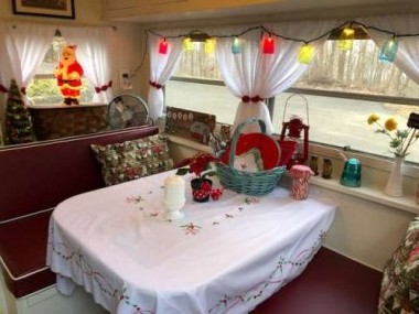 A vintage tablecloth sets the stage in the dinette area.