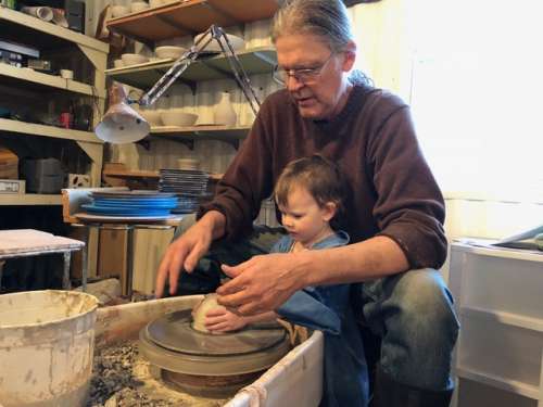 Throwing pots and learning skills from grandpa.