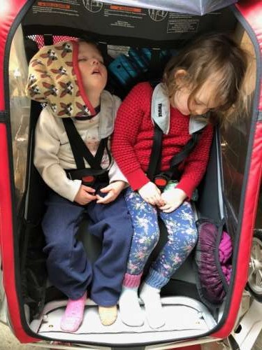 Evan is a rockstar dad and keeps the older girls active!  Here they are asleep in the bike trailer after a long day playing outside.