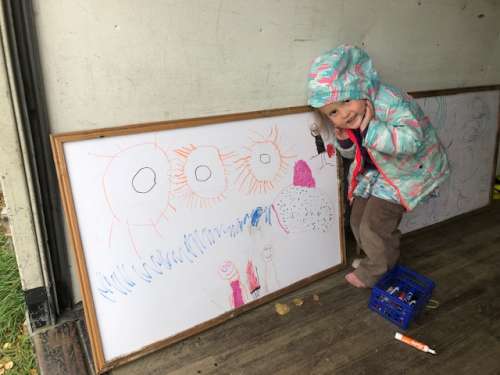 The girls stay occupied while we process the final days of harvest.  Ava was listening to stories and drawing what they were about. 