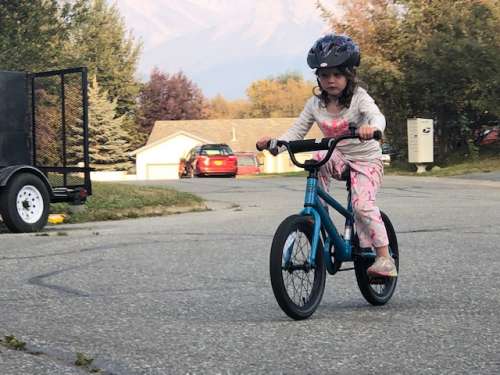 Learning to bike on a smoky day.  Three years old and no training wheels!