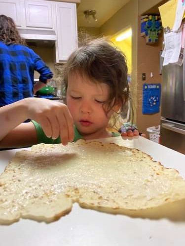 Opal preparing lefse for Thanksgiving