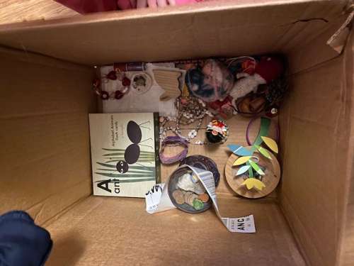 Ava's box of her special, prized things.  She packed them so tenderly in this box and immediately unpacked them onto a high shelf in her room that her sisters cannot reach.