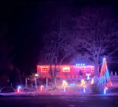 Another favorite, this home has a lights “show” in time with music that you tune into on your car’s radio!