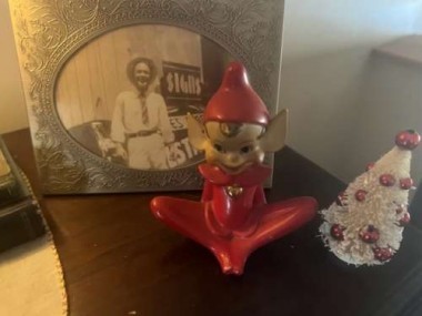 My favorite 1940s pixie, a gift from friends years back. The photo in the background is my grandpa when he was young.