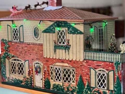 I miss the days of a “little” , when Santa visited the house. My daughter is an adult now. However, Santa still “visits” the tin dollhouse in the kitchen!